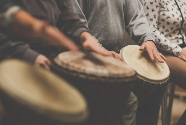 bigstock Group of people playing on dru 313340536WEB2 lets drum
